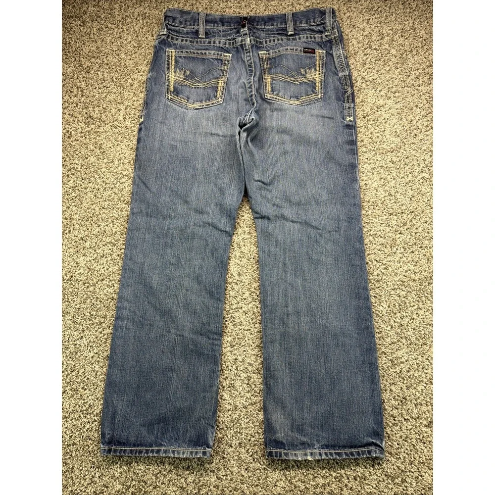Ariat FR M4 Low Rise Boot Cut Jeans Mens 35x32 (Fits 36x30) Distressed‎